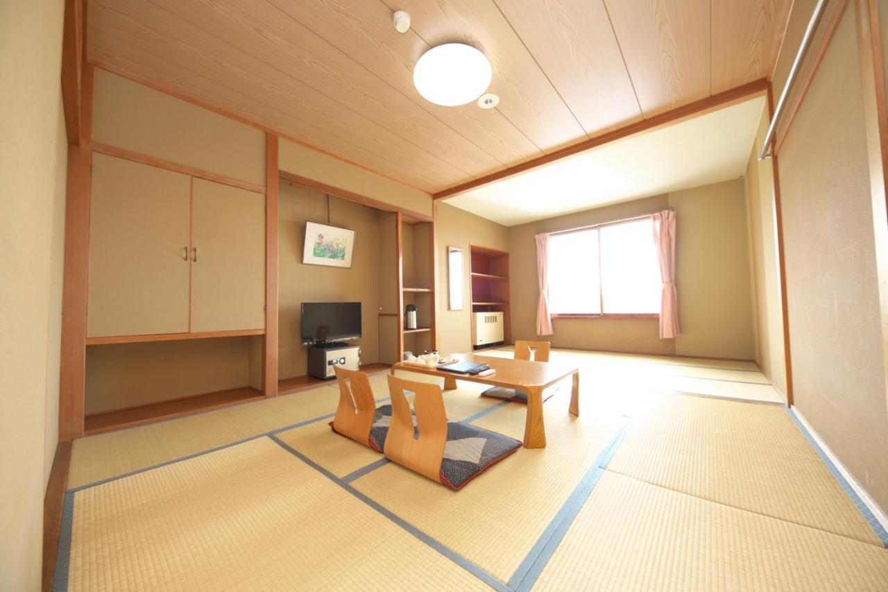 Shiga Swiss Inn Шига Коген Екстериор снимка